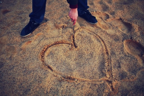 hand-drawing-heart-in-the-sand.jpg