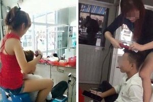 這樣的理髮店正流行！正妹著超短褲「騎著」男生剪頭髮！