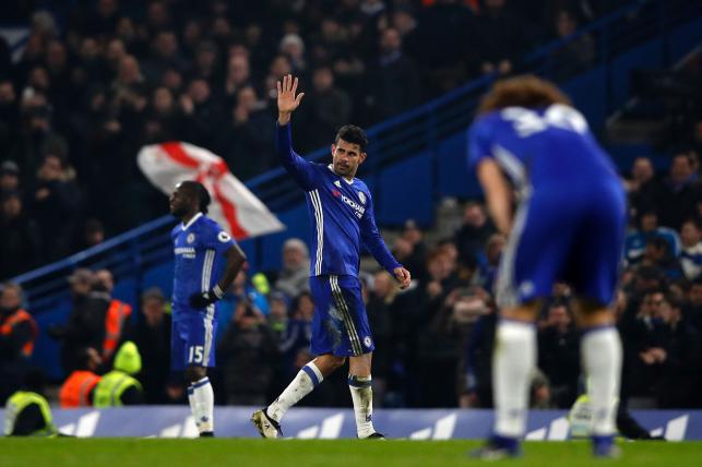 643xNxebde8023c89b02b25491dd10526ccbca-Chelsea-s-Brazilian-born-Spanish-striker-Diego-Costa--C--waves-to-supporters.jpg.pagespeed.ic.NrTo0Qv71J.jpg